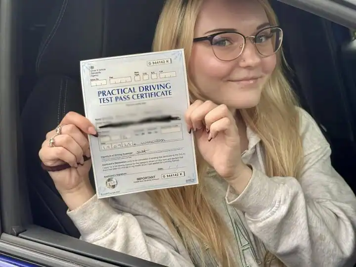 Aaliyah after passing the automatic driving test in Worcester