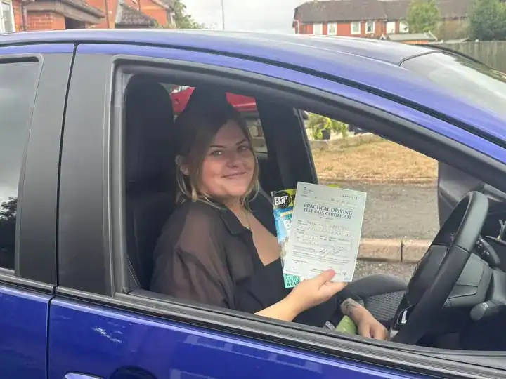Kiera after passing the automatic driving test in Worcester