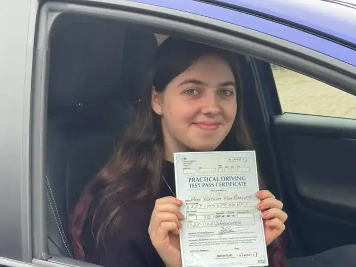 Tilly after passing the automatic driving test in Worcester